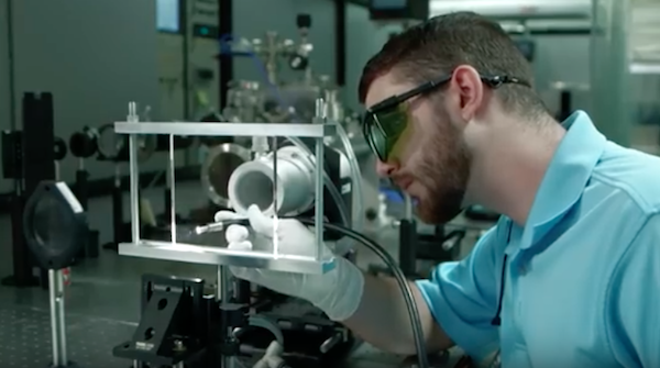 Researcher taking a glass sample